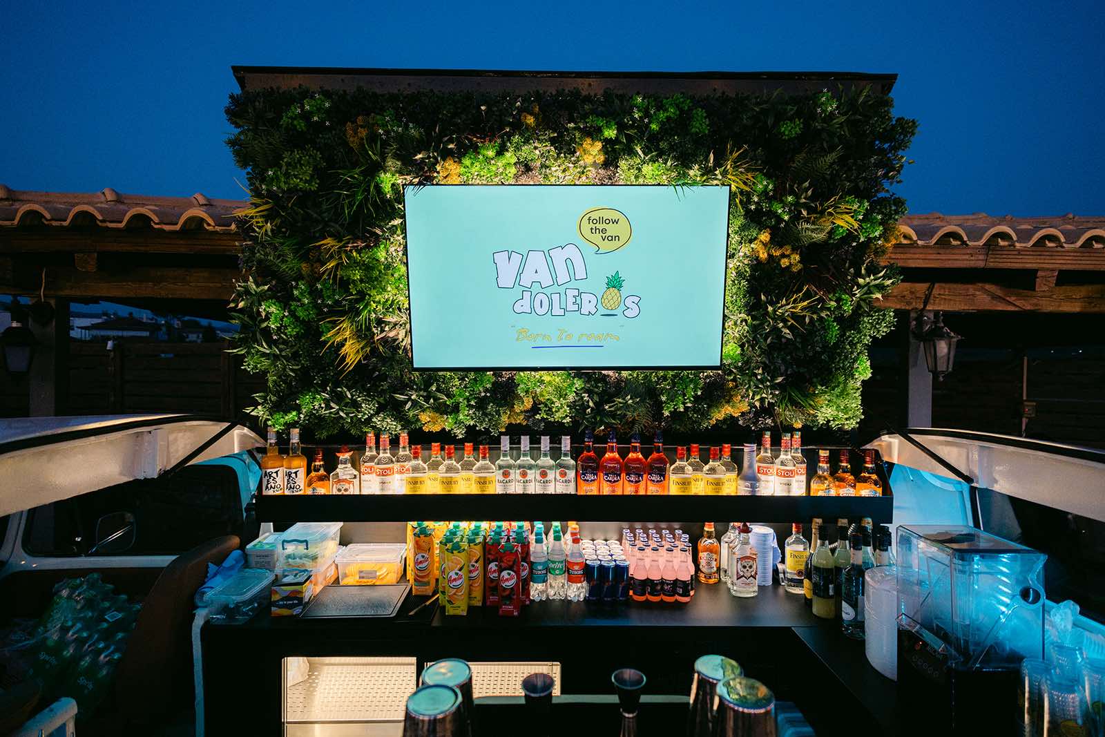 The Vandoleros cocktail bar with its signature green wall